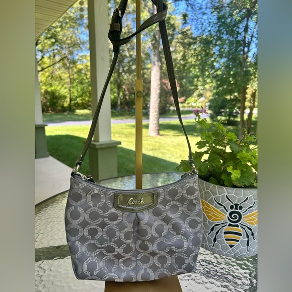 Coach Handbags - Authentic Coach Ashley Dot op Art Grey signature swing pack Crossbody bag.